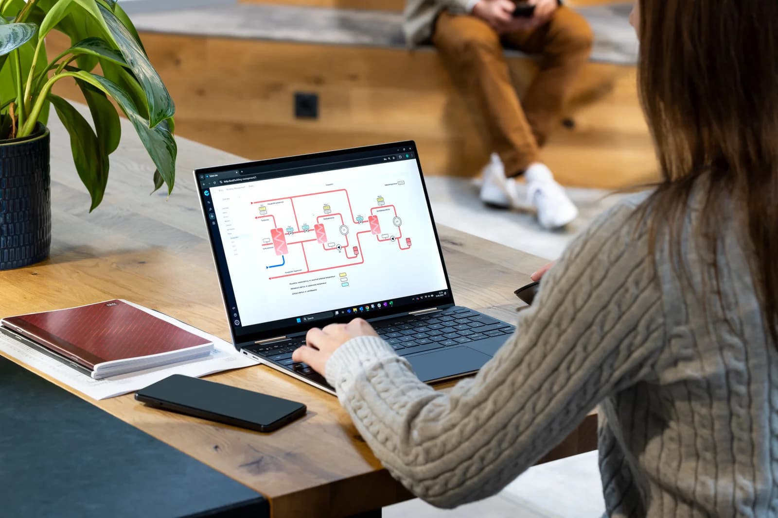 Operator using Bisly Operations Configurator to view building systems